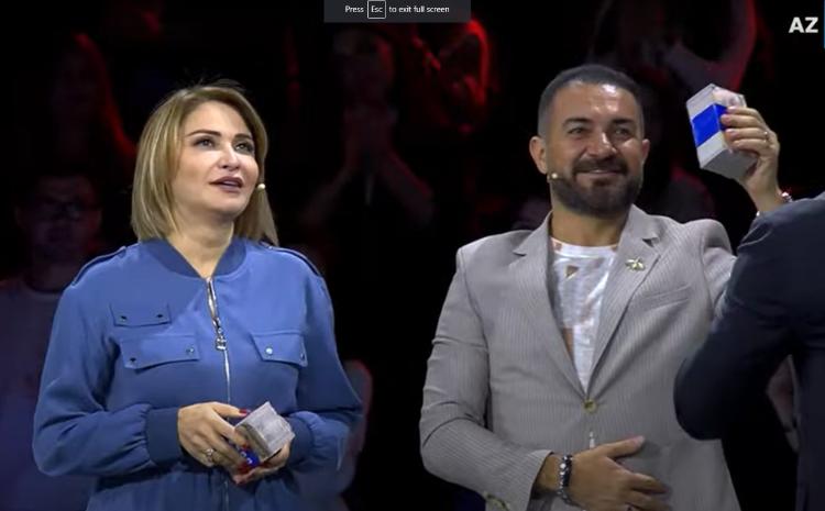 Əməkdar artist xanımı ilə "Düşən pullar"da: Bu cavab onlara 5000 manat qazandırdı